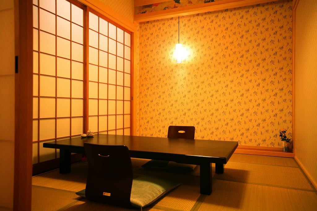 Hotel Tenzankaku Kaiyutei Sirahama Szoba fotó